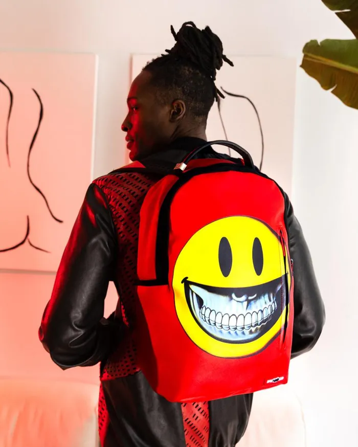 SPRAYGROUND Backpacks SMILE BIG GRIN RON ENGLISH COLLAB 8211 Universal SPRAYGROUND Backpacks SMILE BIG GRIN RON ENGLISH COLLAB 8211 Universal